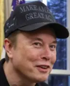 Musk smirking, click for content